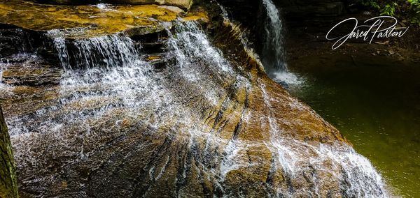 Water flowing through rocks in river