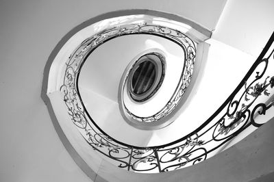 Low angle view of spiral staircase at home