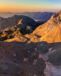 Scenic view of mountains against sky during sunset