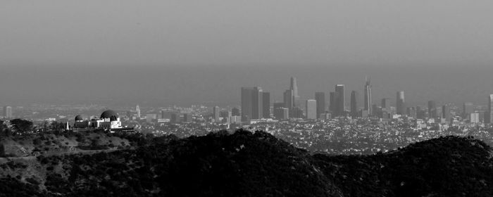 Gritty panorama of los angeles and the griffith observatory.
