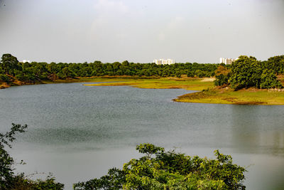 Scenic view of river against sky