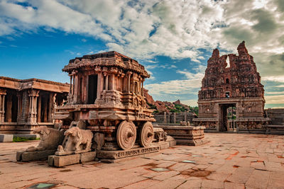 Old temple building against sky