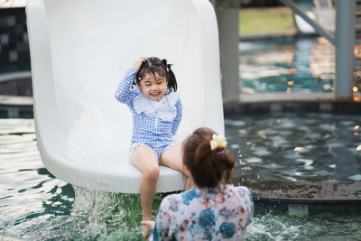 High angle view of young woman in swimming pool