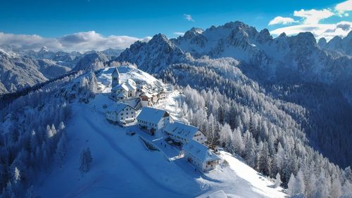 Snow covered mountains against sky