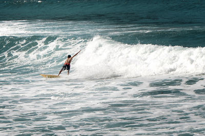 Man surfing in sea