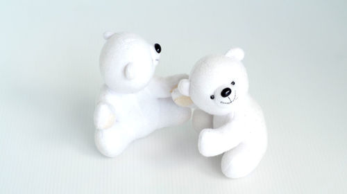 Close-up of stuffed toy against white background