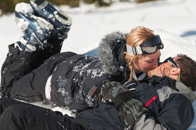 People with ice cream in snow