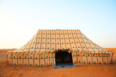 Facade of house against clear sky