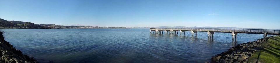 water, blue, clear sky, copy space, tranquil scene, tranquility, sea, waterfront, scenics, built structure, rippled, beauty in nature, nature, architecture, river, sky, idyllic, lake, day, no people