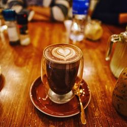 Close-up of coffee served on table