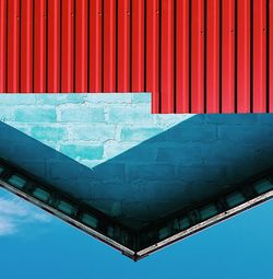 Upside down image of house against sky
