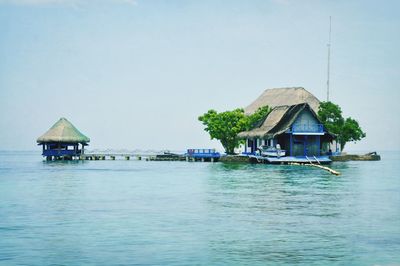 Calm sea against clear sky