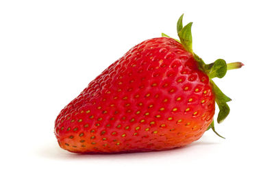 Close-up of strawberry against white background