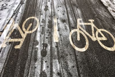 High angle view of text written on road