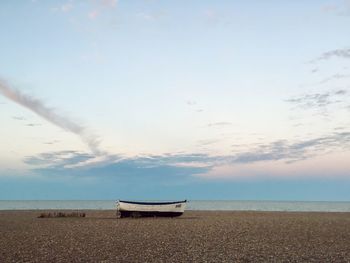 British beach and boat at sunset in suffolk