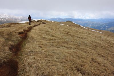 Man standing on hill