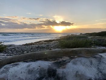 Scenic view of sea against sky during sunset