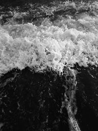 High angle view of surf on beach