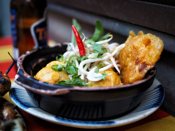 Close-up of food served in bowl on table