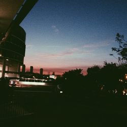 Built structure against sky at sunset