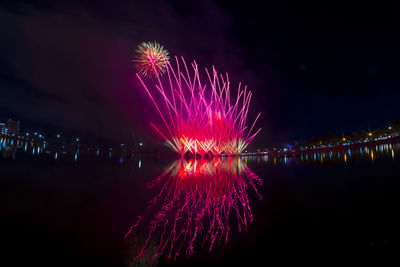 Firework display at night