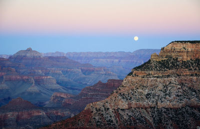 Scenic view of mountains against sky during sunset