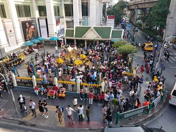 High angle view of people walking on road