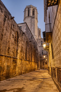 The historic barrio gotico in barcelona at twilight with the cathedral