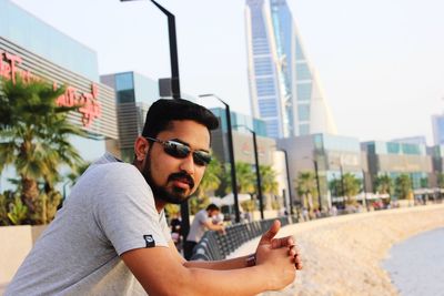 Portrait of young man wearing sunglasses