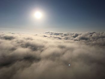 Scenic view of clouds and moon in sky