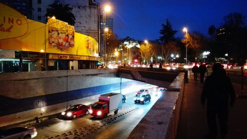 People on road at night