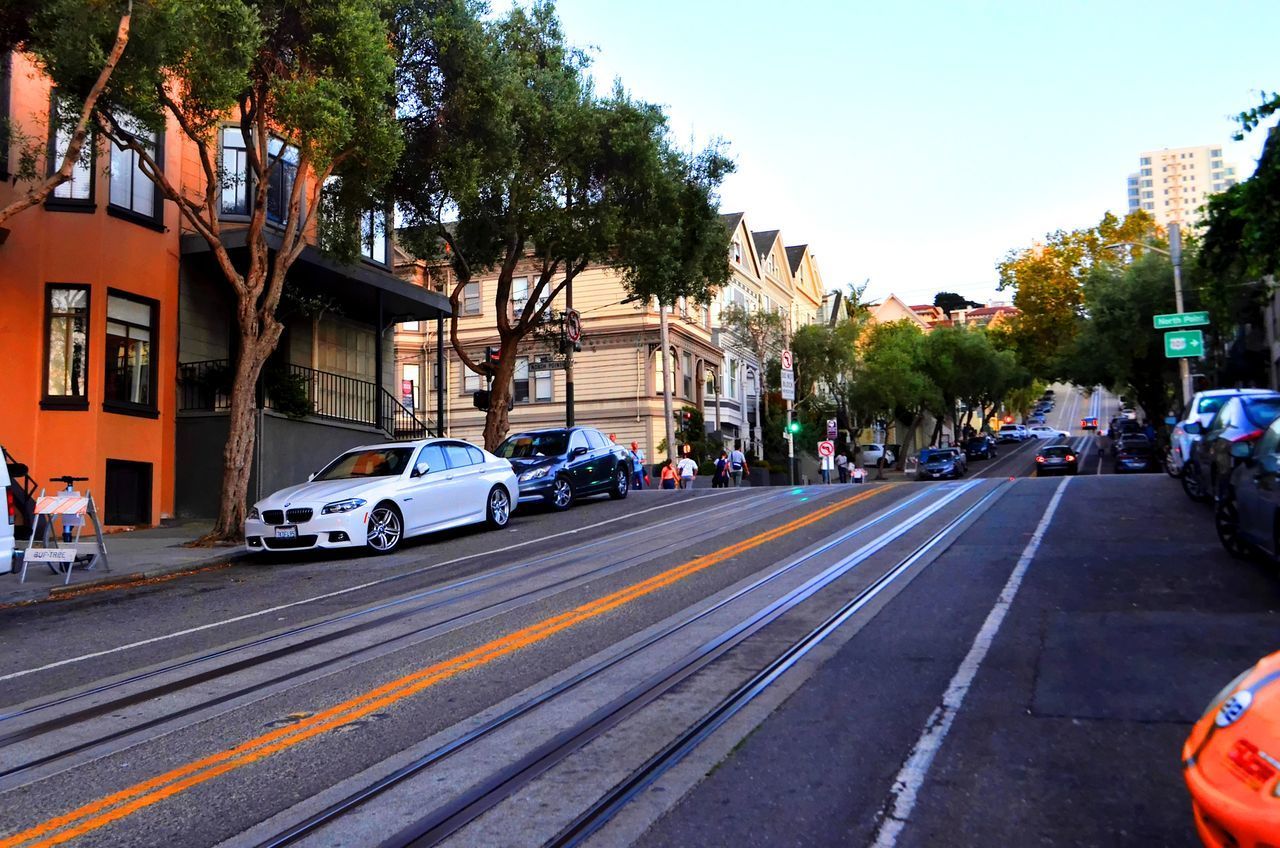 VEHICLES ON ROAD IN CITY