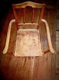 High angle view of empty chair on table