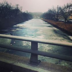 Empty road in park during winter