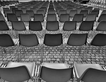 High angle view of empty chairs in stadium