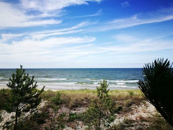 Scenic view of beach against sky