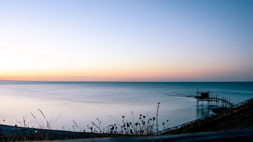 Scenic view of sea against clear sky