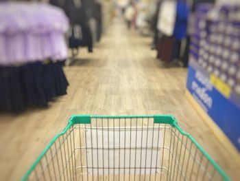 Empty shopping cart at supermarket