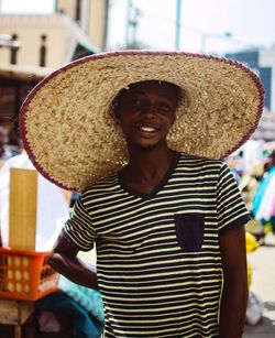 Portrait of smiling man wearing hat