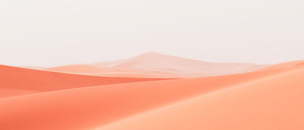 Scenic view of desert against clear sky