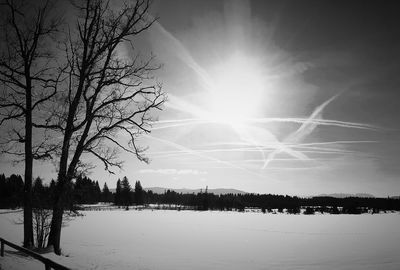 Scenic view of snow covered landscape against sky