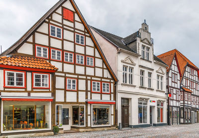 Buildings in city against sky