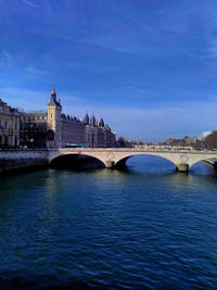 Bridge over river in city