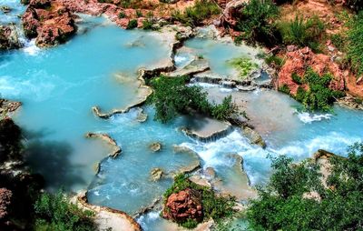 High angle view of river amidst rocks