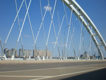 View of suspension bridge against clear sky