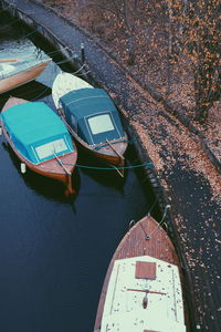 High angle view of boats moored in water