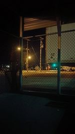 Illuminated street lights on footpath at night