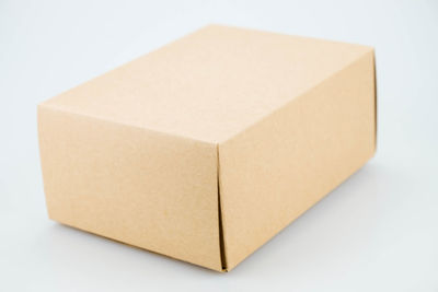 High angle view of paper box on white background