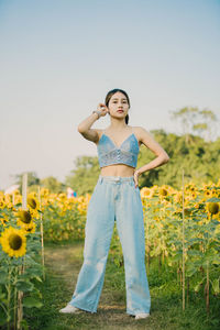 Full length of woman standing on field