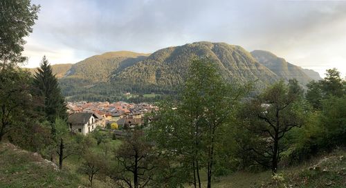 Buildings in town against sky